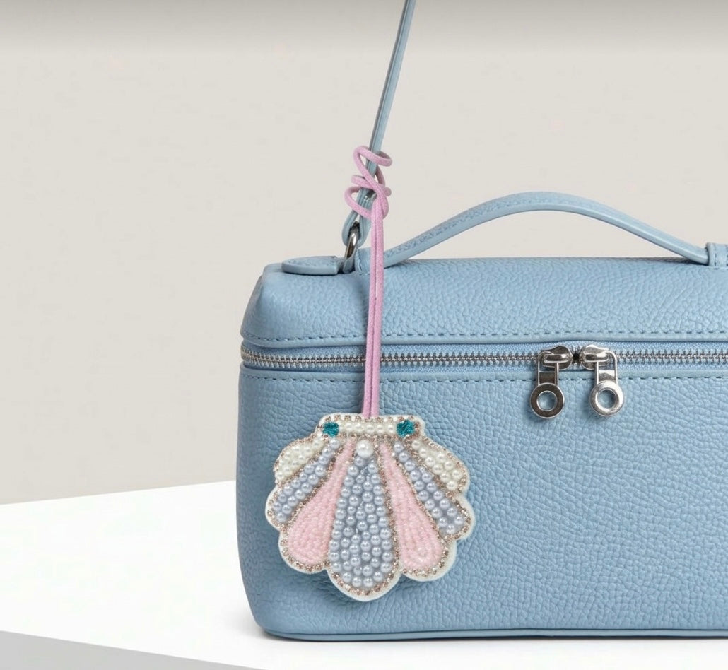 MWAC034 - تعليقة شنطة صناعه يدوية بشكل صدفة - Aya